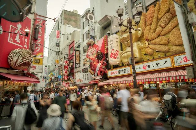 A busy restaurant street in Namba, Osaka at night